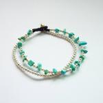 Double Strands Of Turquoise Blue Chip Beads And..